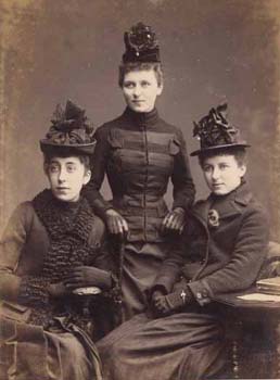 Portrait of three fashionable ladies dressed in black. They were probably on one of the Society's committees. They are similar in appearance and may be sisters. 