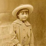 girl in
							hat and coat