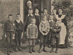 Informal photograph of the children with staff