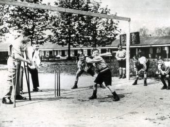 Boys playing cricket at St Martin's Orthopaedic Hospital and School, Pyrford, Surrey