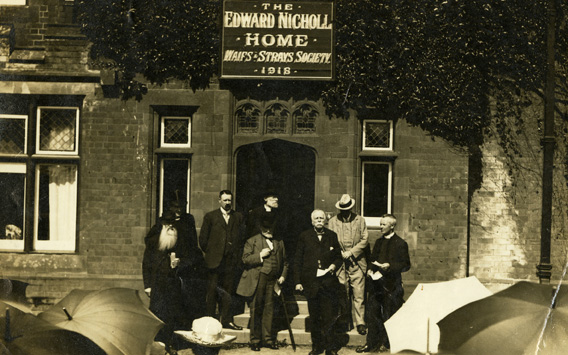 Group at the front of the Edward Nicholl Home For Babies during the opening ceremony