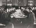 Boys eating in a dinning hall