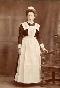Dressed in her maid's clothing, this girl was just about to start her career in domestic service. During her 12 years at the Bolton-le-Sands Home, she would have been well trained for her new life.